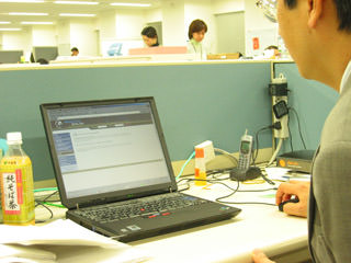 Business English Web Student learning on laptop